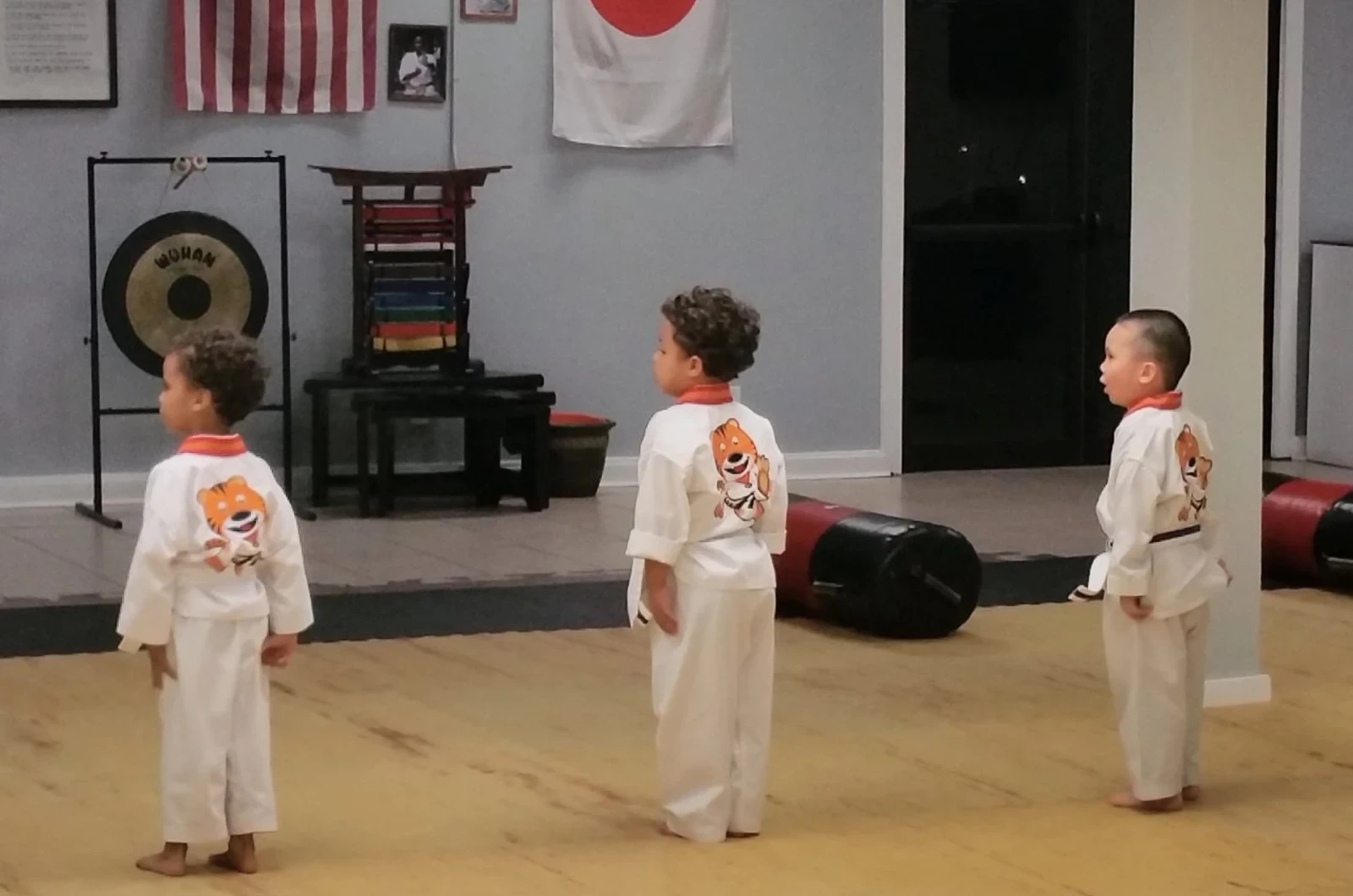 Kids learning sportsmanship through martial arts